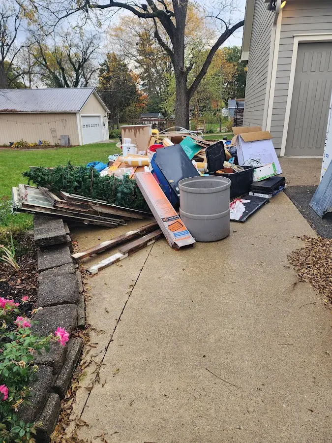 Dumpster being loaded with debris for Roofing Dumpster Rental in Mount Pocono